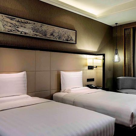 Hotel Pullman Qingdao Ziyue Extérieur photo