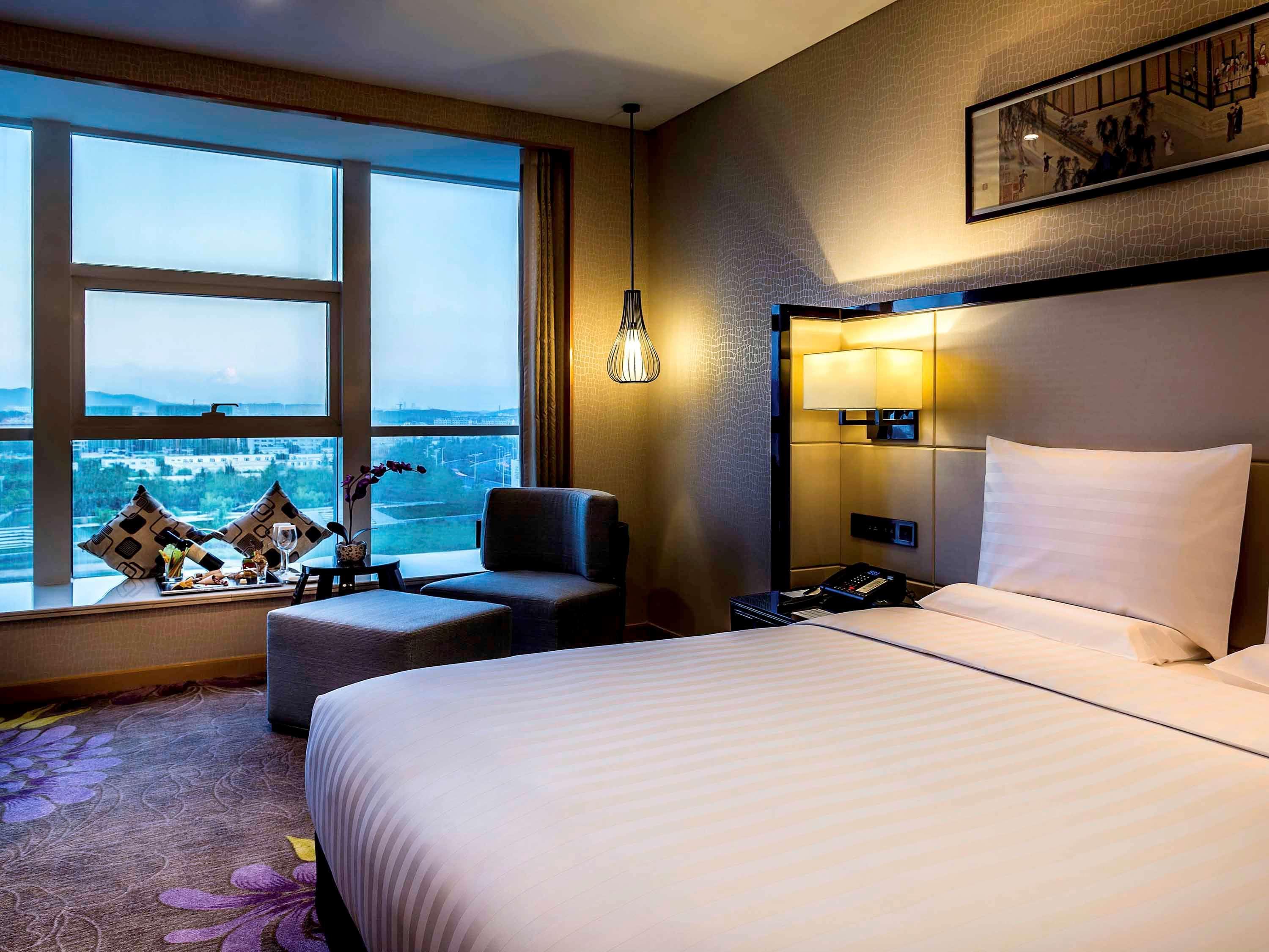 Hotel Pullman Qingdao Ziyue Extérieur photo