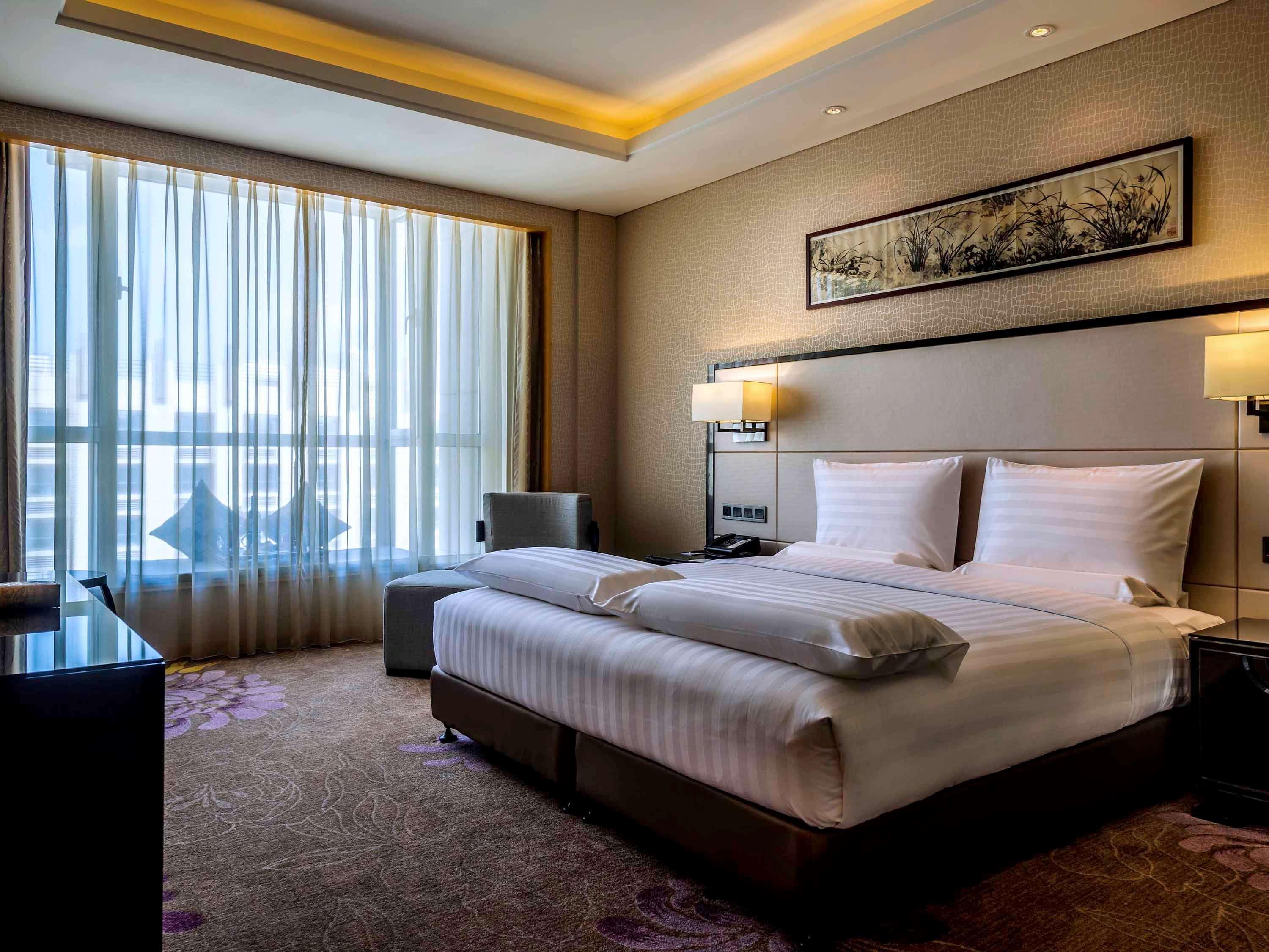 Hotel Pullman Qingdao Ziyue Extérieur photo