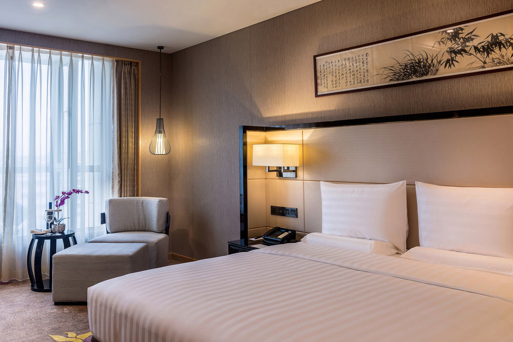Hotel Pullman Qingdao Ziyue Extérieur photo