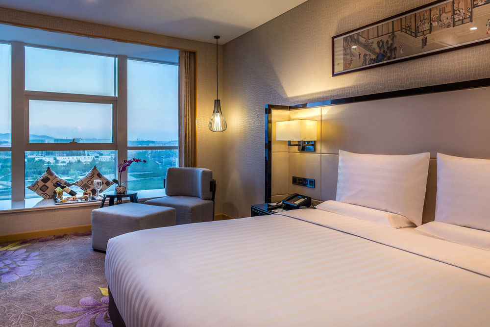 Hotel Pullman Qingdao Ziyue Extérieur photo