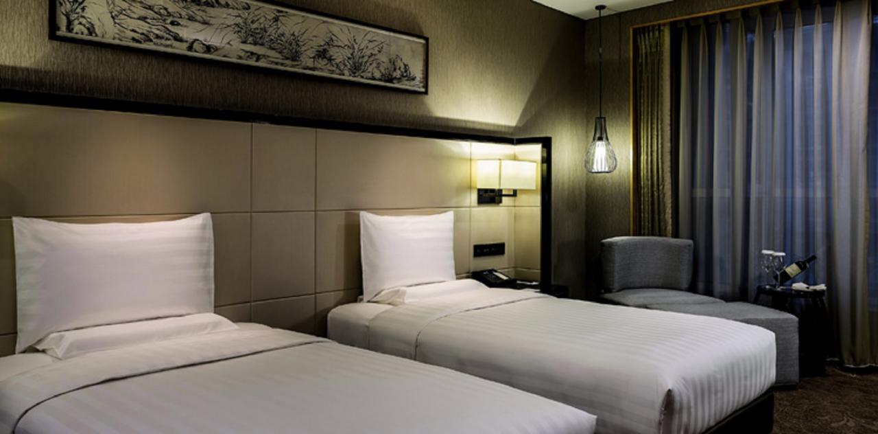 Hotel Pullman Qingdao Ziyue Extérieur photo