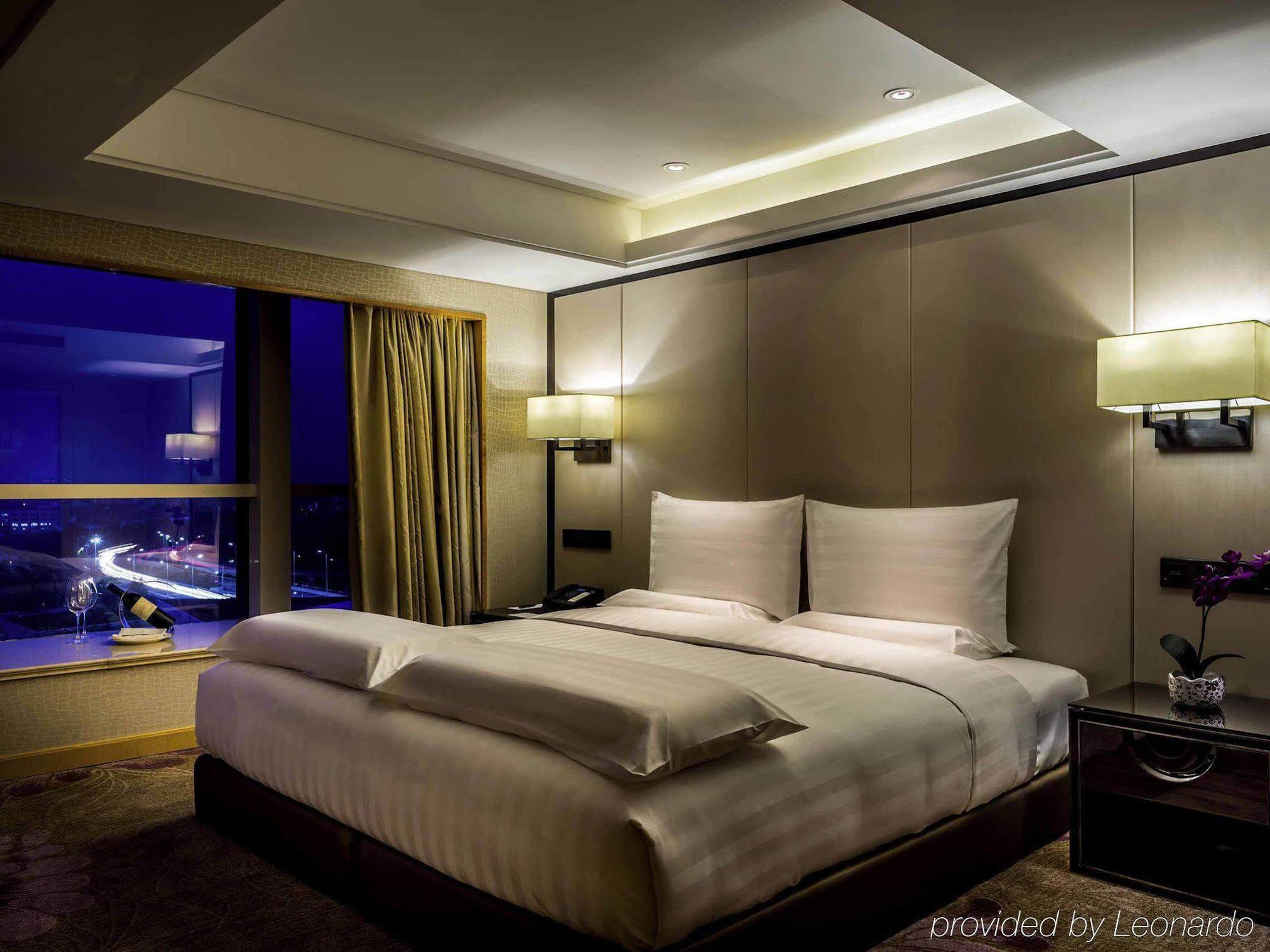 Hotel Pullman Qingdao Ziyue Extérieur photo