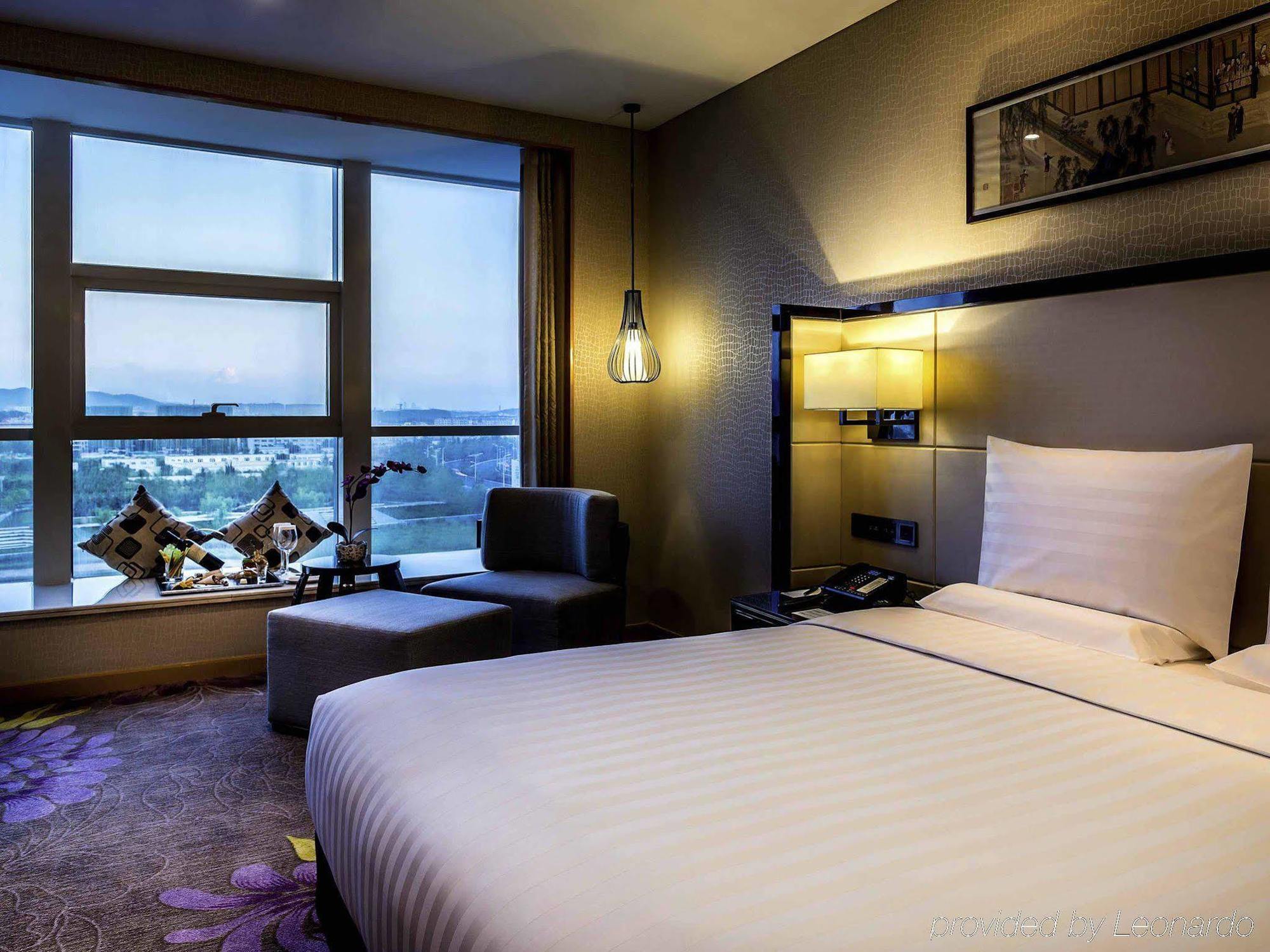 Hotel Pullman Qingdao Ziyue Extérieur photo