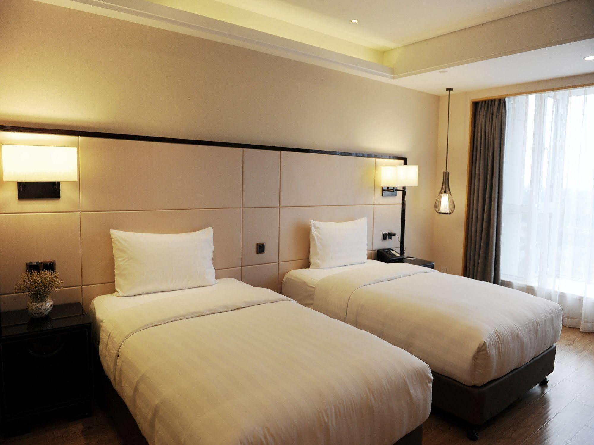 Hotel Pullman Qingdao Ziyue Extérieur photo
