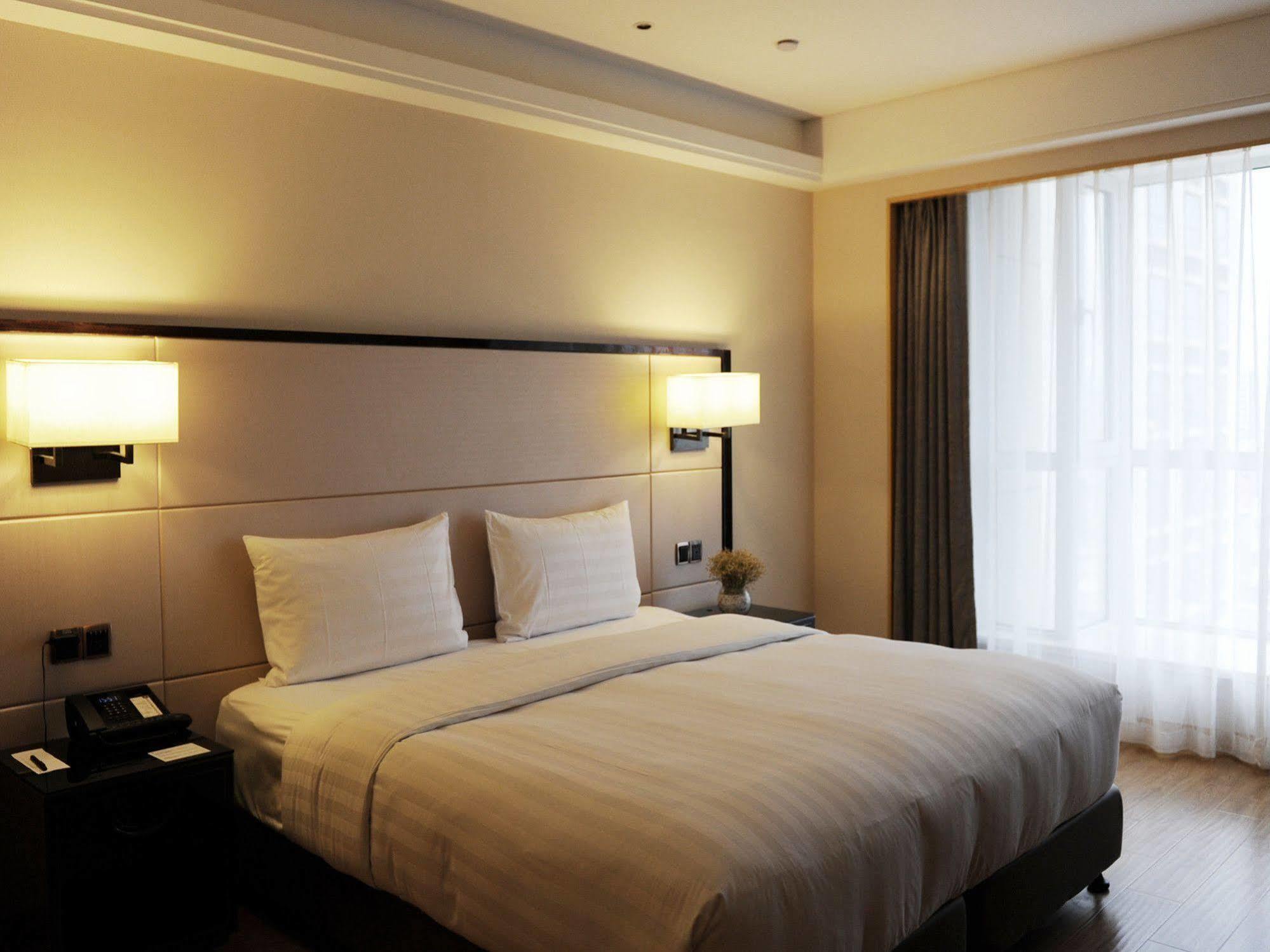 Hotel Pullman Qingdao Ziyue Extérieur photo