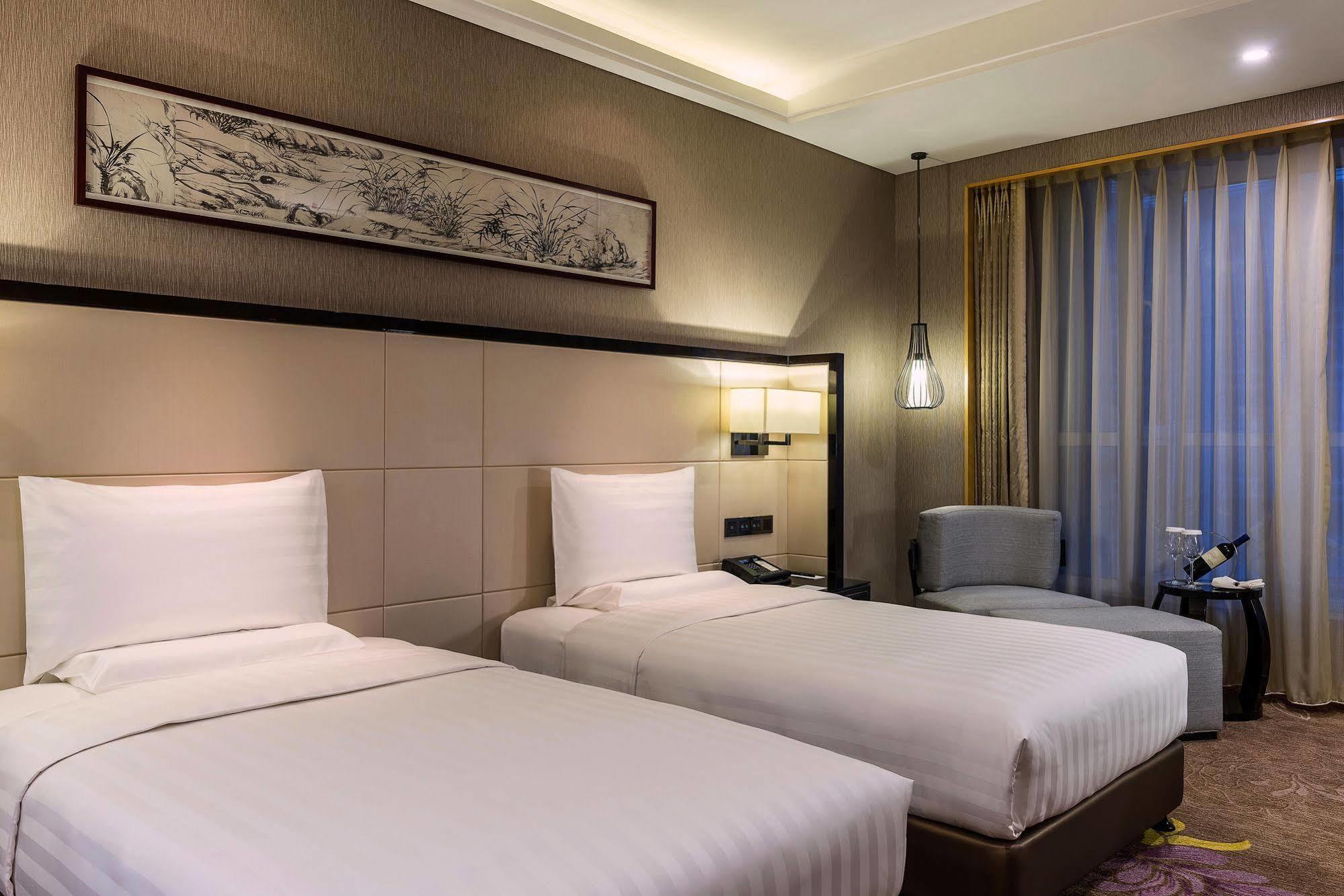 Hotel Pullman Qingdao Ziyue Extérieur photo